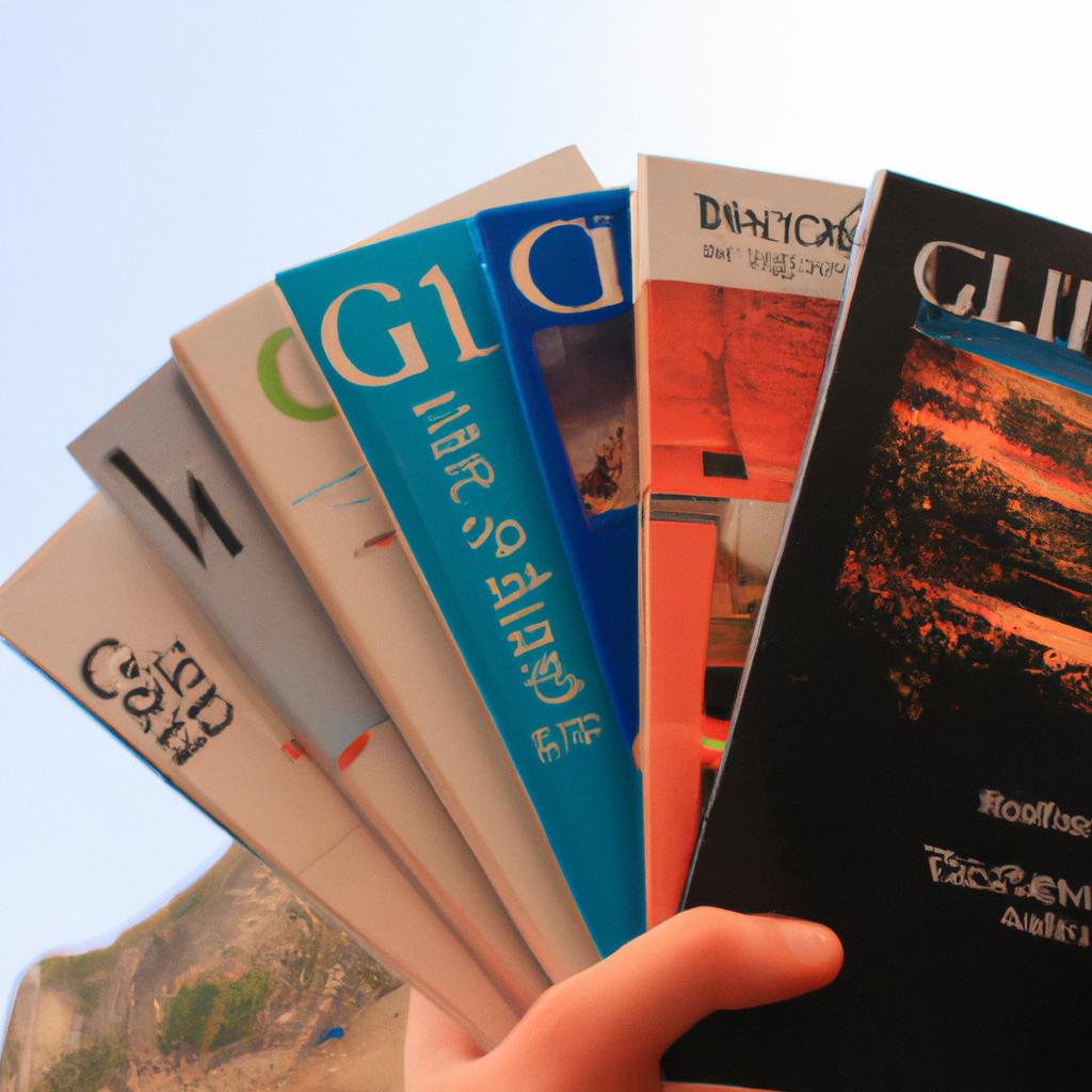 Person holding travel brochures